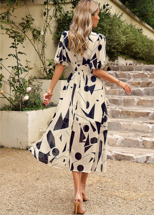 Estela | Vestido midi floral favorecedor