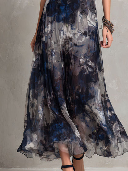 Vestido maxi bohemio elegante de chiffon azul marino con estampado floral para la noche